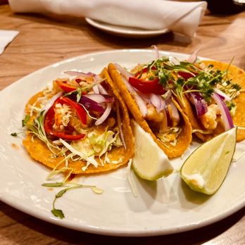 Palmilla Cocina Y Tequila signature dishes Lobster TacosPrime Ribeye FajitasGuacamoleMargaritas